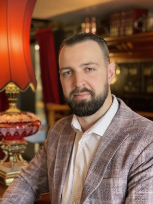 Portrait of Jeremy Hess, Associate.
